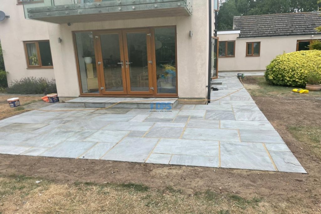 Grey Sandstone Slabbed Patio with Buff Grout in Cheltenham (1)